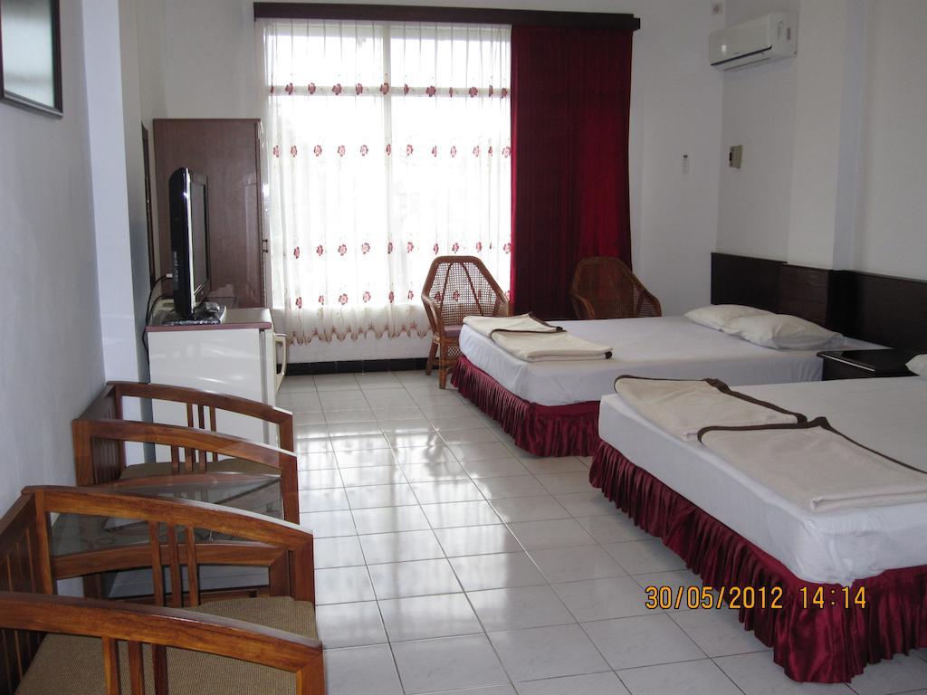Hotel Santosa Malang Szoba fotó